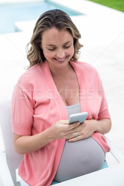 Donna incinta donna telefono home incinta Foto d'archivio © wavebreak_media