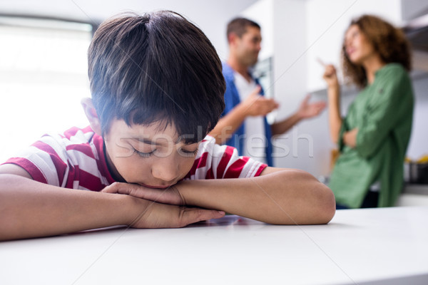 Boy feeling sad while his parents quarrelling Stock photo © wavebreak_media