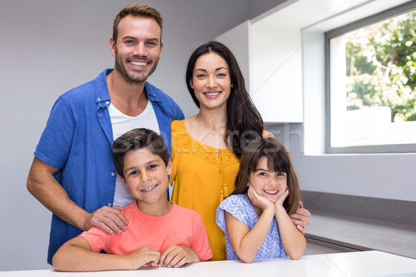 Famille heureuse salon permanent maison femme fille [[stock_photo]] © wavebreak_media