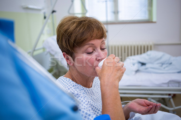Nurse giving medication to patient Stock photo © wavebreak_media