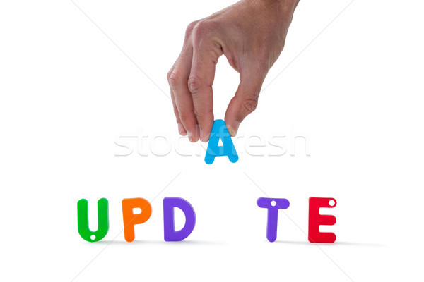 Hand arranging update word Stock photo © wavebreak_media