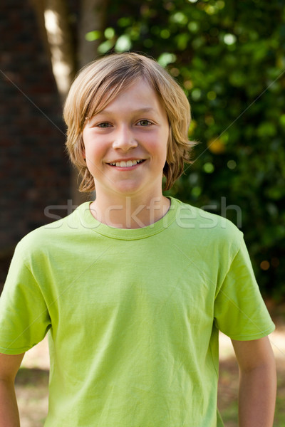 Little boy looking at the camera in the garden Stock photo © wavebreak_media