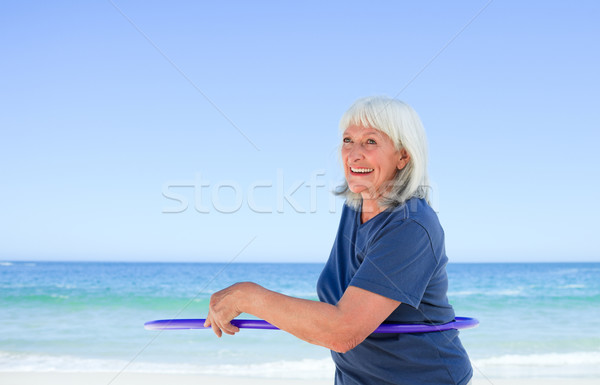 Stock fotó: Idős · nő · játszik · tengerpart · sport · nyár