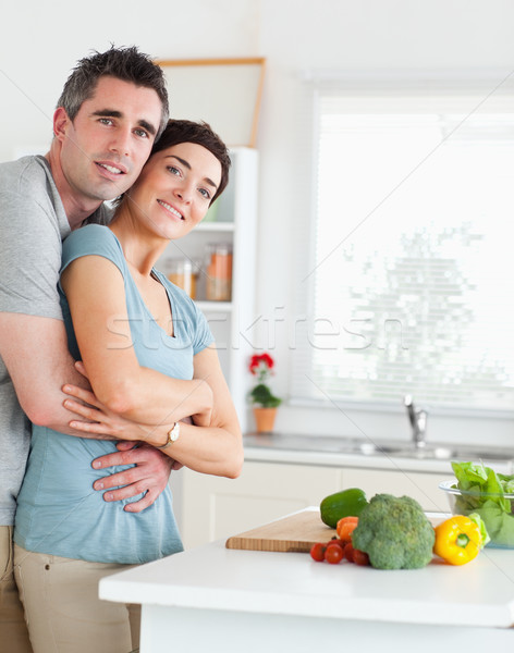 Encantador hombre mujer cocina casa Foto stock © wavebreak_media