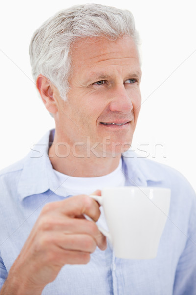 Portrait homme mûr potable thé blanche café [[stock_photo]] © wavebreak_media