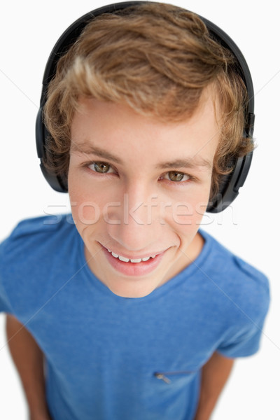 男 學生 頭戴耳機 白 商業照片 © wavebreak_media