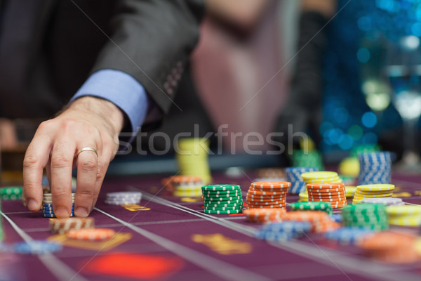 Man placing a bet at the casino Stock photo © wavebreak_media