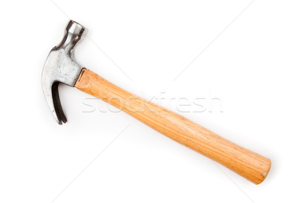 Lying hammer with a wooden handle against a white background Stock photo © wavebreak_media