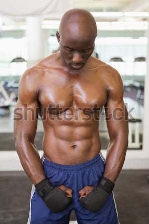 Mid section of a shirtless muscular man in gym Stock photo © wavebreak_media