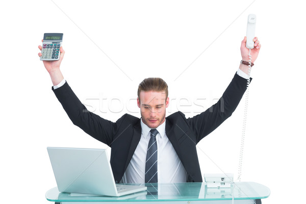 Geschäftsmann Jubel halten Rechner Telefon weiß Stock foto © wavebreak_media