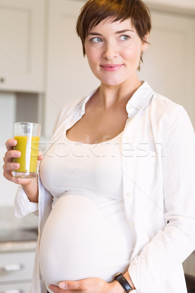 Сток-фото: беременная · женщина · стекла · апельсиновый · сок · домой · кухне · счастливым