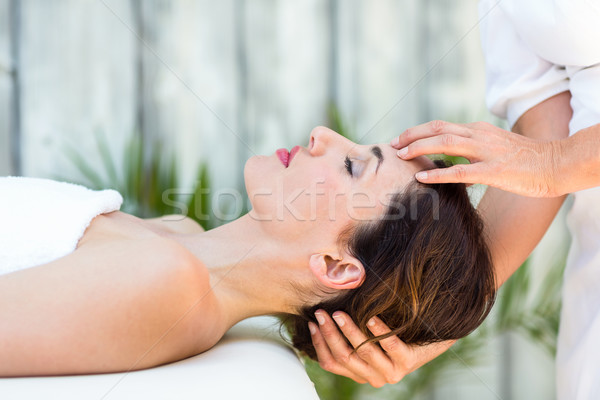 Stock photo: Brunette receiving head massage
