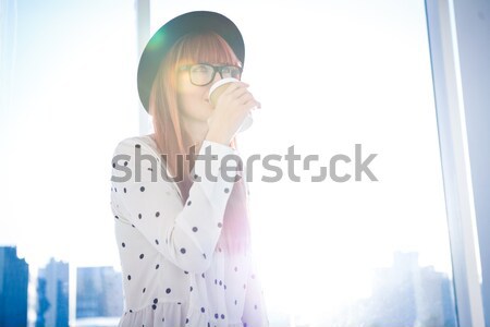 Composite image of focused asian woman thinking Stock photo © wavebreak_media