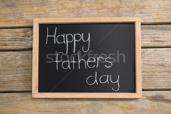 Stock photo: Overhead view of slate with happy fathers day text