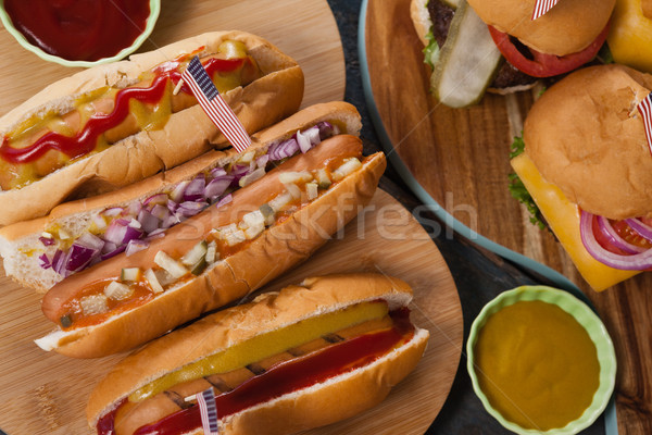 Close-up of hot dogs and hamburgers decorated with 4th july theme Stock photo © wavebreak_media