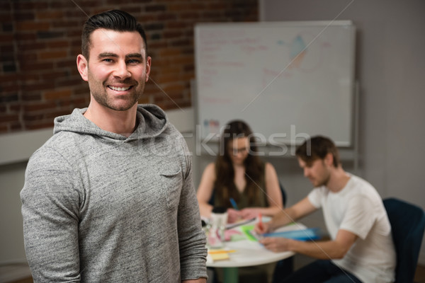 Portret glimlachend uitvoerende kantoor vrouw corporate Stockfoto © wavebreak_media