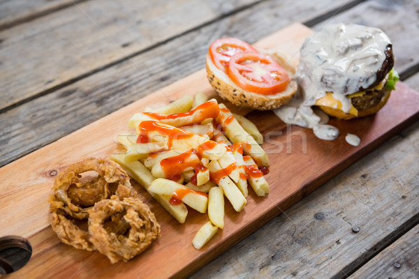 French fries with sauce by burger and onion rings Stock photo © wavebreak_media
