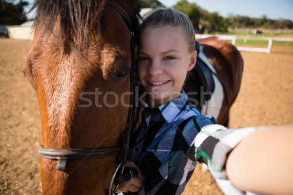 Girl taking a selfie with horse Stock photo © wavebreak_media