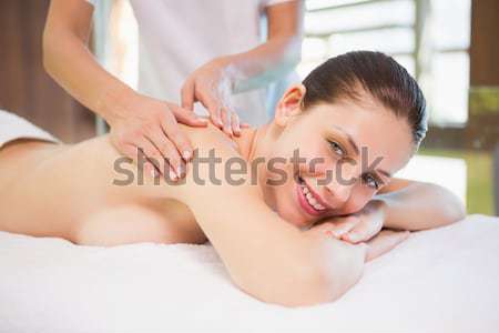 Femme souriante massage portrait jeune femme souriant [[stock_photo]] © wavebreak_media