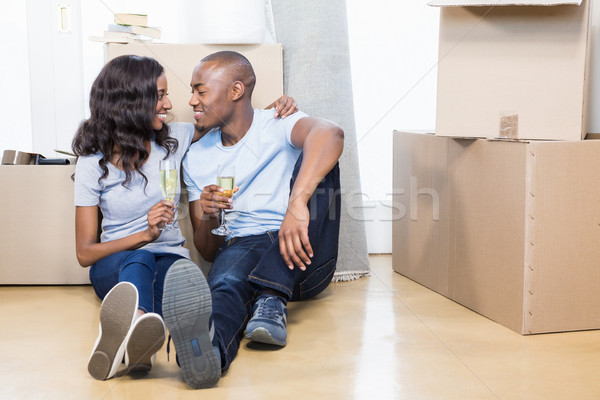 Young couple holding glasses of champagne Stock photo © wavebreak_media