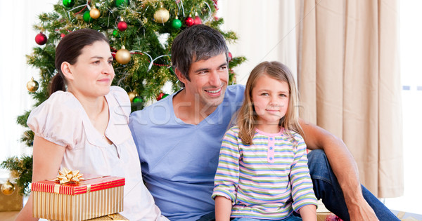 Happy family having fun with Christmas presents Stock photo © wavebreak_media