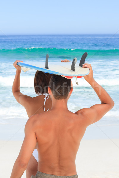 Lovers with their surfboard Stock photo © wavebreak_media