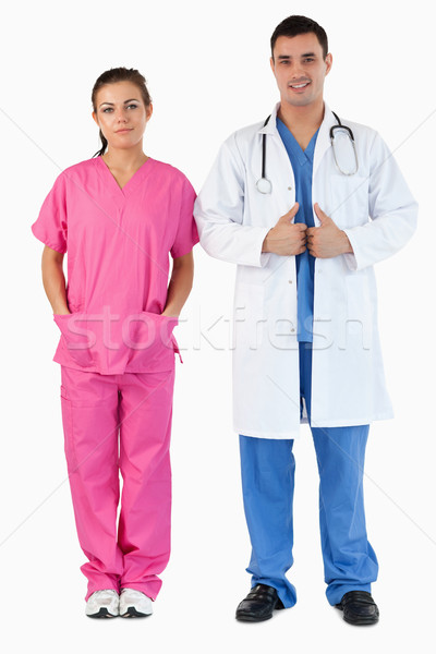 Stock photo: Portrait of a doctor and a nurse against a white background