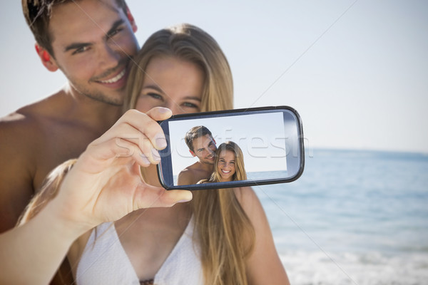 Couple taking selfie on smartphone Stock photo © wavebreak_media
