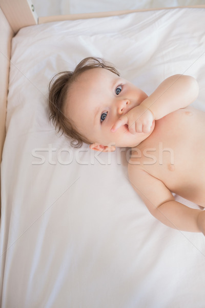 Baby boy with finger in mouth  Stock photo © wavebreak_media