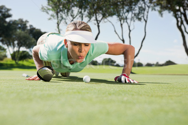 Femminile golfista palla verde Foto d'archivio © wavebreak_media