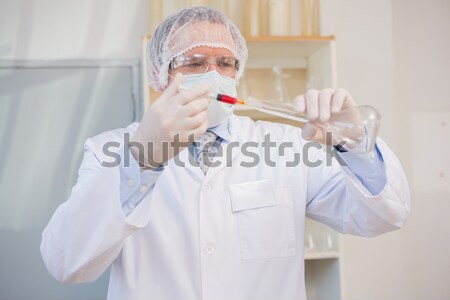 Dentista mascarilla quirúrgica mirando cámara herramientas Foto stock © wavebreak_media