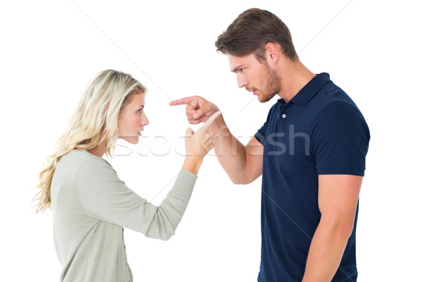 Angry couple facing off during argument Stock photo © wavebreak_media