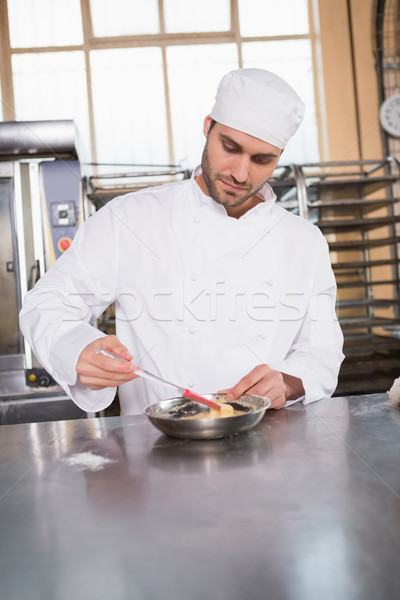 Focused baker preparing a pastry Stock photo © wavebreak_media