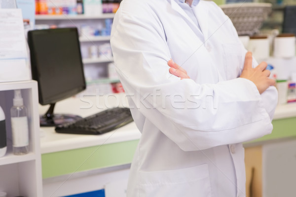 Mid section of junior pharmacist with arms crossed Stock photo © wavebreak_media