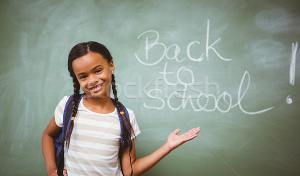 Portré aranyos kislány osztályterem áll kéz Stock fotó © wavebreak_media
