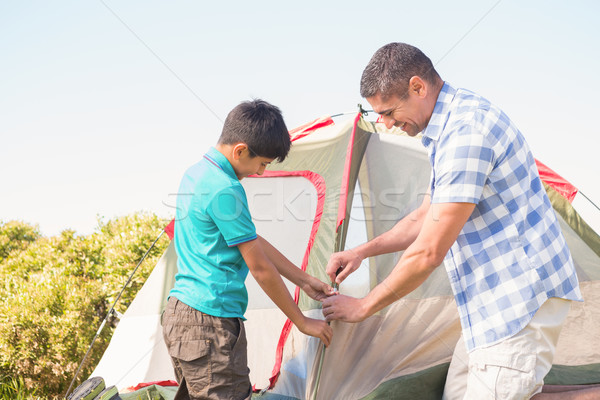 Father and son pitching their tent Stock photo © wavebreak_media