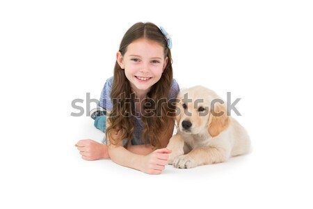 Happy girl holding her dog Stock photo © wavebreak_media