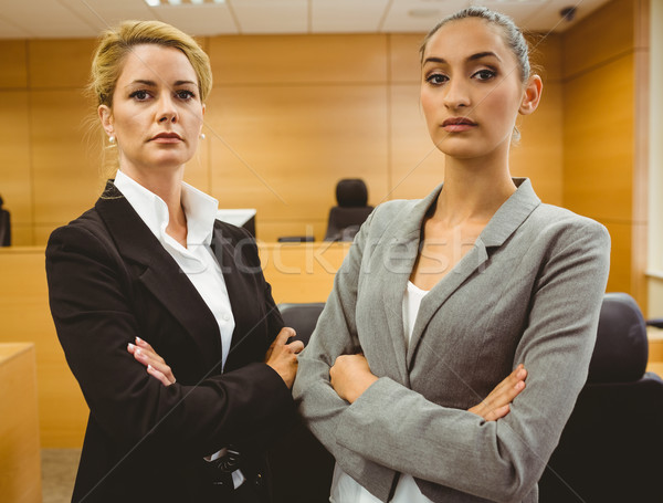 Two serious lawyers standing with arms crossed Stock photo © wavebreak_media