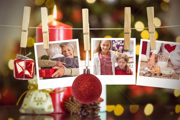 Stock photo: Composite image of hanging christmas photos