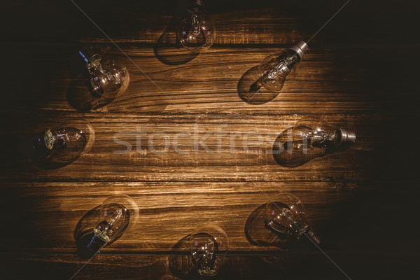 Lampadine frame tavolo in legno texture legno desk Foto d'archivio © wavebreak_media