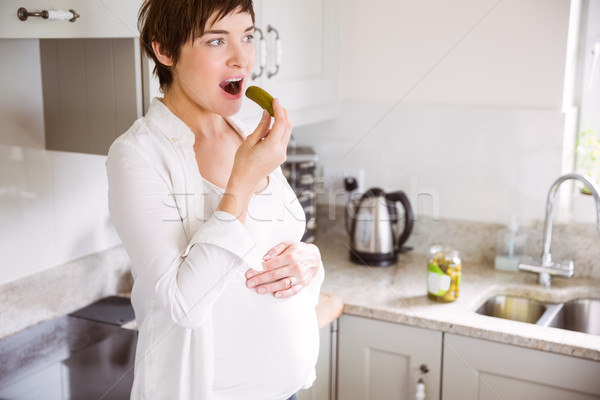 Zwangere vrouw eten home keuken gelukkig zwangere Stockfoto © wavebreak_media