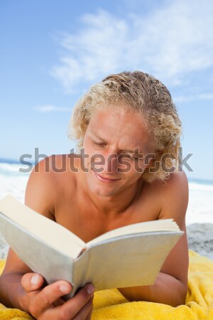 Close up of woman looking away while carrying surfboard Stock photo © wavebreak_media