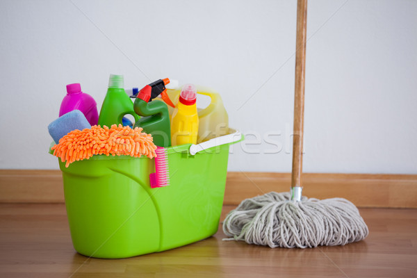 Mop and cleaning equipment on wooden floor Stock photo © wavebreak_media