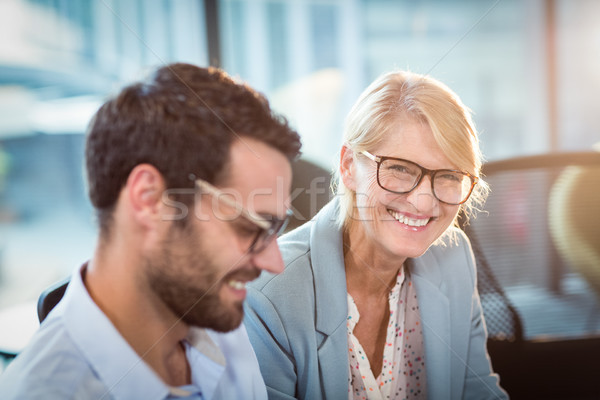 Businesswoman interacting with a colleague Stock photo © wavebreak_media