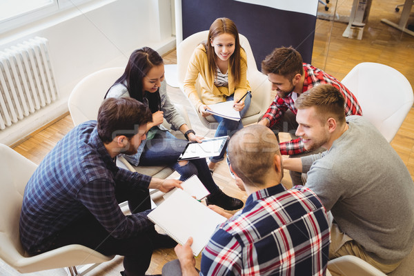 Stock photo: High angle view of business people discussing in meeting room