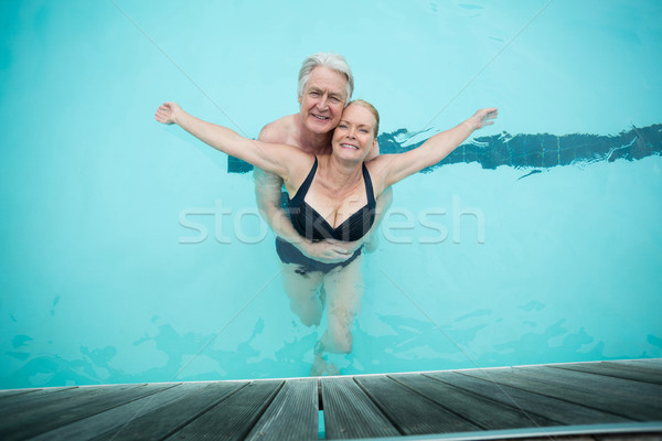 Maturité couple piscine femme eau amour [[stock_photo]] © wavebreak_media