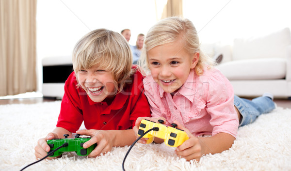 [[stock_photo]]: Adorable · enfants · jouer · jeux · vidéo · living · famille