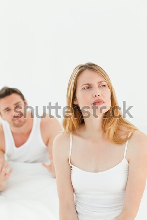 Young couple having a pillow fight  Stock photo © wavebreak_media