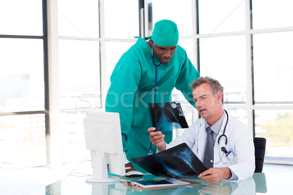 Doctors looking at an X-ray Stock photo © wavebreak_media