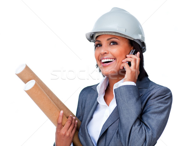 Smiling architect on phone wearing a hardhat Stock photo © wavebreak_media